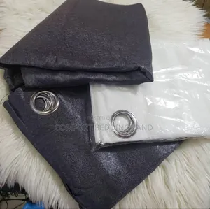 Dark Gray Curtains With a White Net