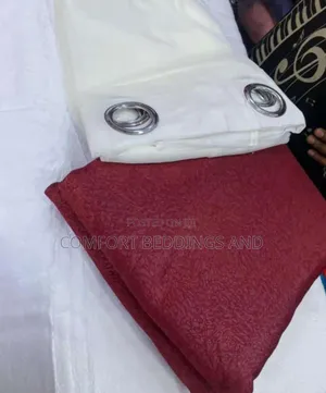 Pair of Maroon Curtains With White Net