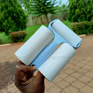 Portable Lint Remover/Roller With 2 Refills (50 Sheets)
