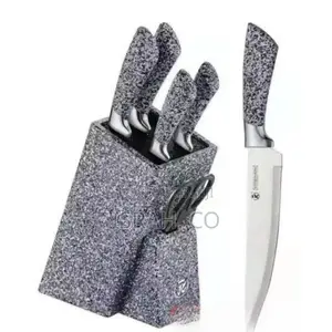 7 Piece Black Dotted Handle Knife Set in Wooden Stand