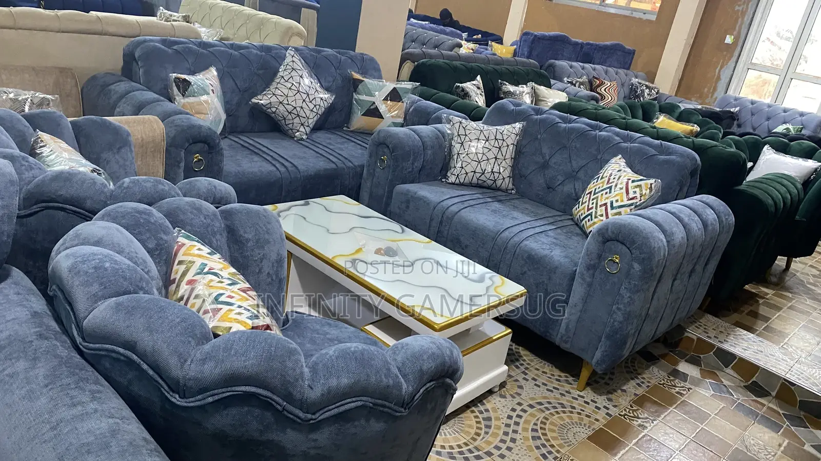 A Chesterfield Sofa in Sky Blue Readily Available.