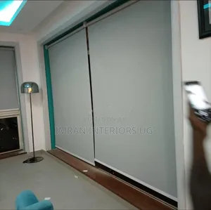 Cream Roller and Horizontal Office Blinds Per Square Meter.