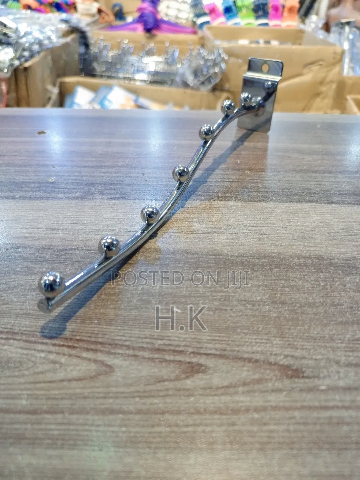 Wall-Mounted Clothes Hanger Rack.