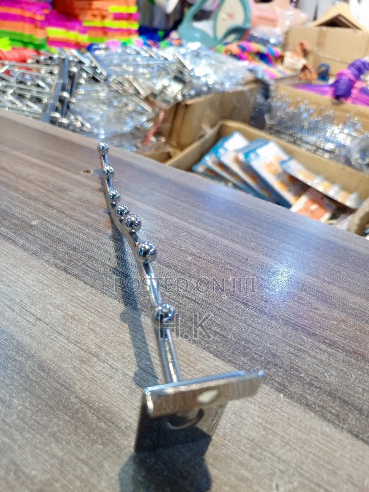 Wall-Mounted Clothes Hanger Rack.