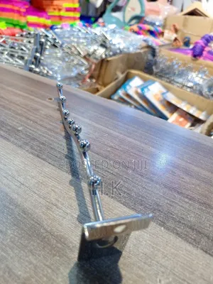 Wall-Mounted Clothes Hanger Rack.