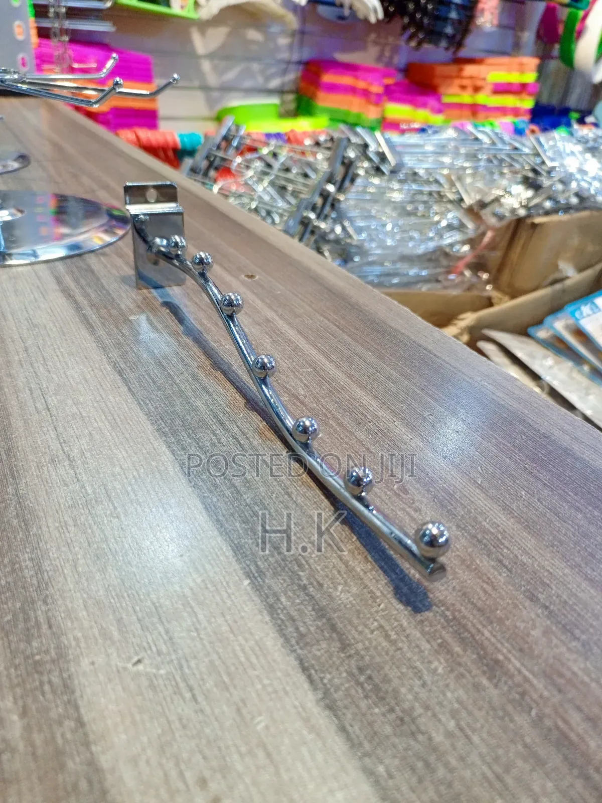 Wall-Mounted Clothes Hanger Rack.