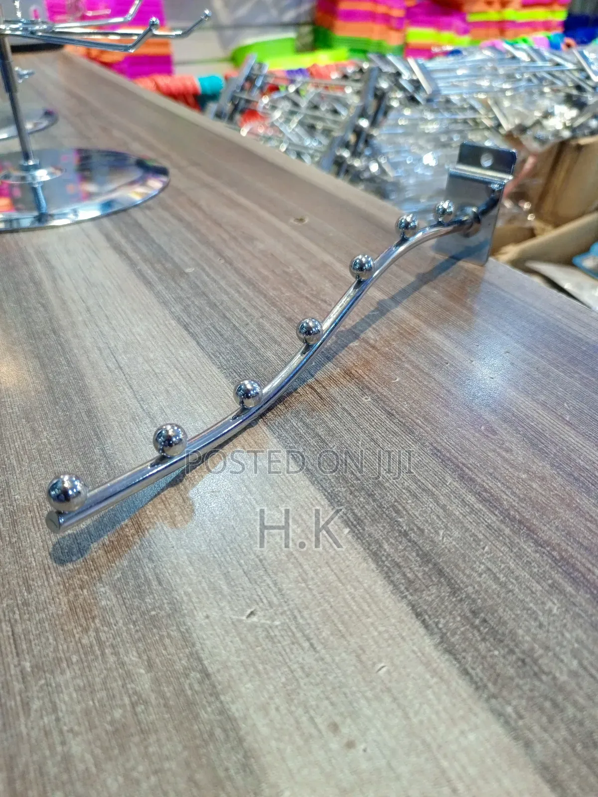 Wall-Mounted Clothes Hanger Rack.