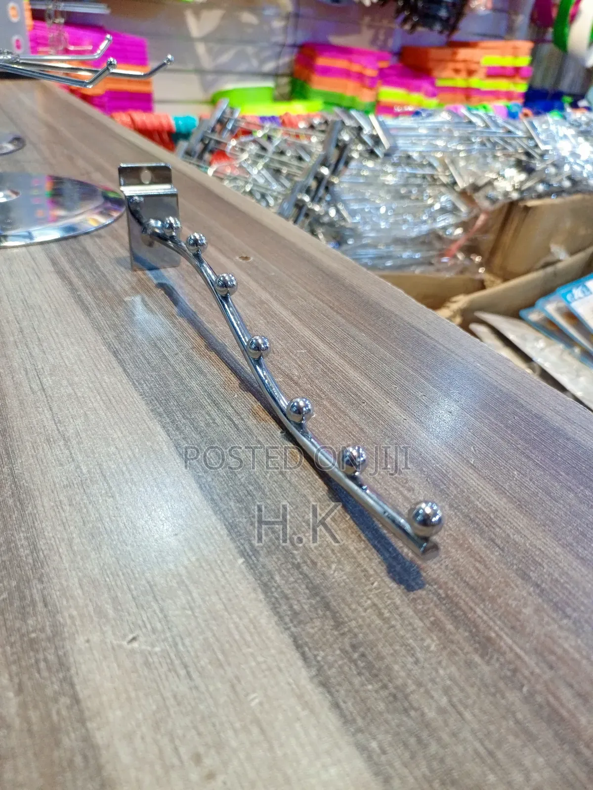 Wall-Mounted Clothes Hanger Rack.