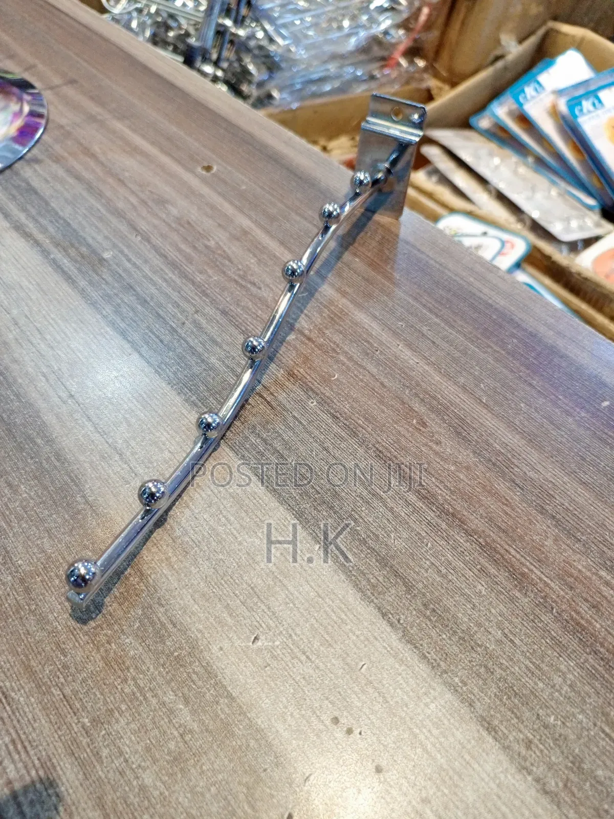 Wall-Mounted Clothes Hanger Rack.