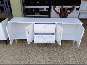 White Flat Tv Stand With Lines Design on Doors