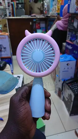Mini Hand Held Fan .