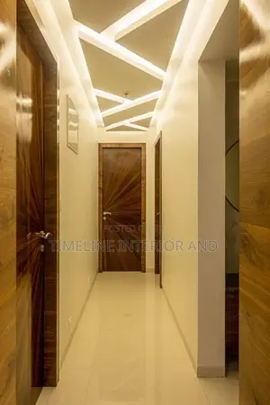 Elegant White Gypsum Board Ceiling in Corridor