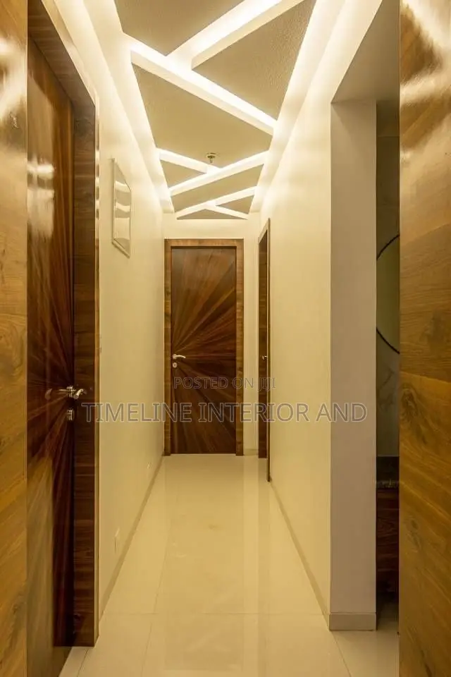Elegant White Gypsum Board Ceiling in Corridor