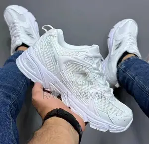 Original Unisex Triple White New Balance 560 Sneakers