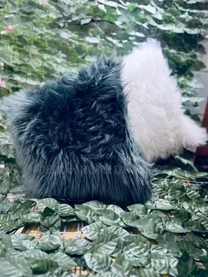White and Dark Grey Fluffy Cushion