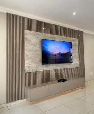 Sleek Panels and Marble Sheet TV Unit