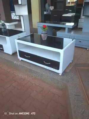 White Center Table With Black Glass and Black Drawers