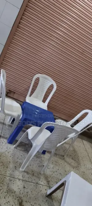 Plastic White Chairs and Blue Table Set