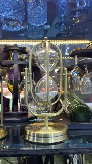 Time-Measuring Device Featuring Two Glass Bulbs Connected