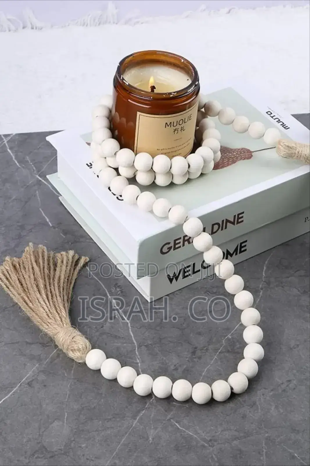 A Decorative Wood Bead Garland With Tassels