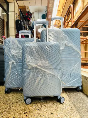 A Set of Shodealy Blue Rubber Suitcases Available