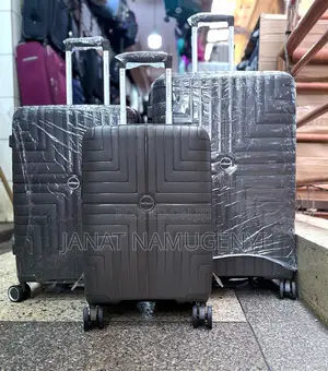 A Set of Shodealy Black Rubber Suitcases Available