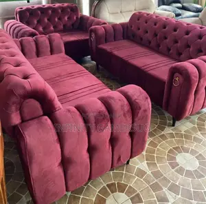 A Classy Chesterfield Sofa in Maroon Readily Available