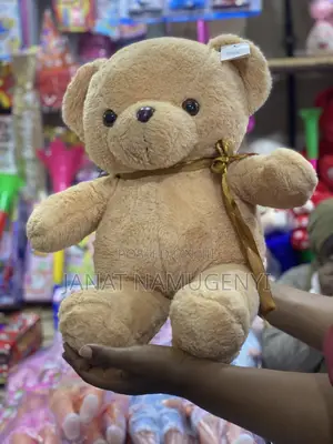 Cream Bear With Golden Ribbon