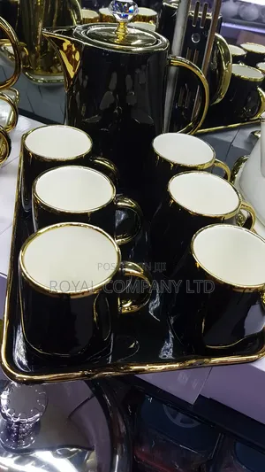 6 Pieces of Ceramic Cups and Serving Kettle