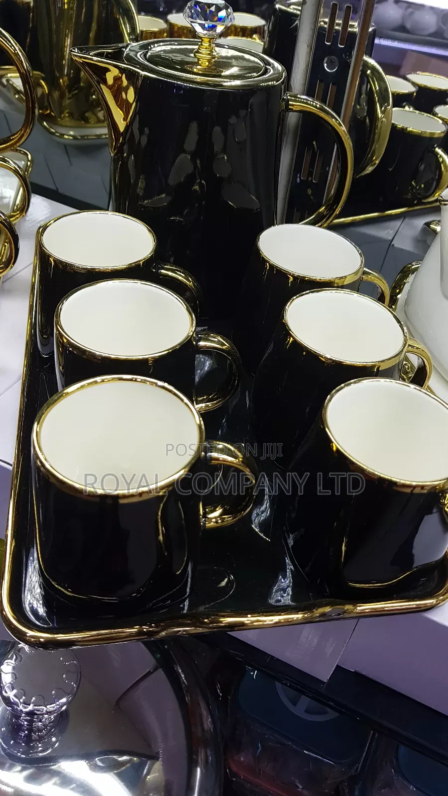 6 Pieces of Ceramic Cups and Serving Kettle