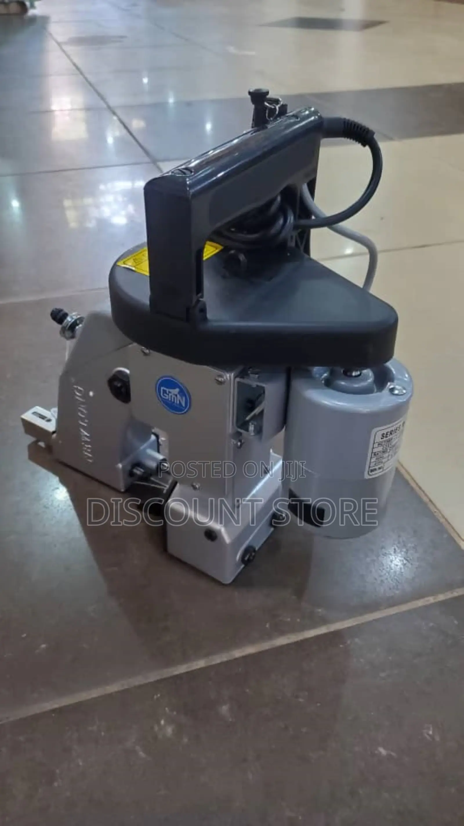 Pneumatic Electronic Bag Closing Machine.