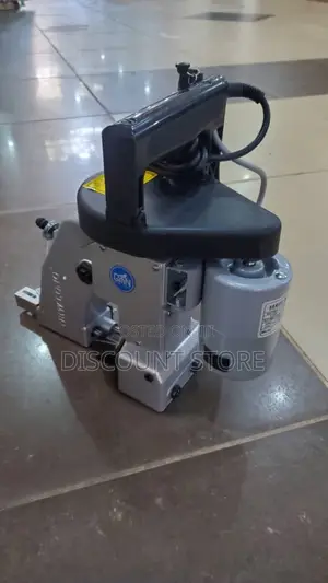 Pneumatic Electronic Bag Closing Machine.