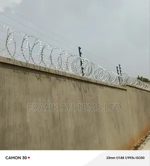 Electric Fence System With Razor Wire