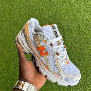 Original White/Orange New Balance 740 Sneakers