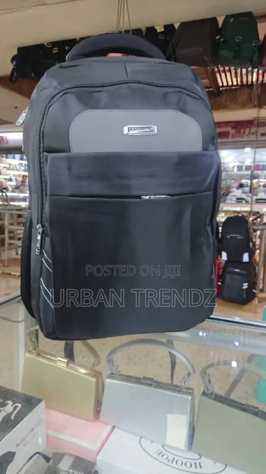 A Black Laptop Backpack With a Gray Accent Panel