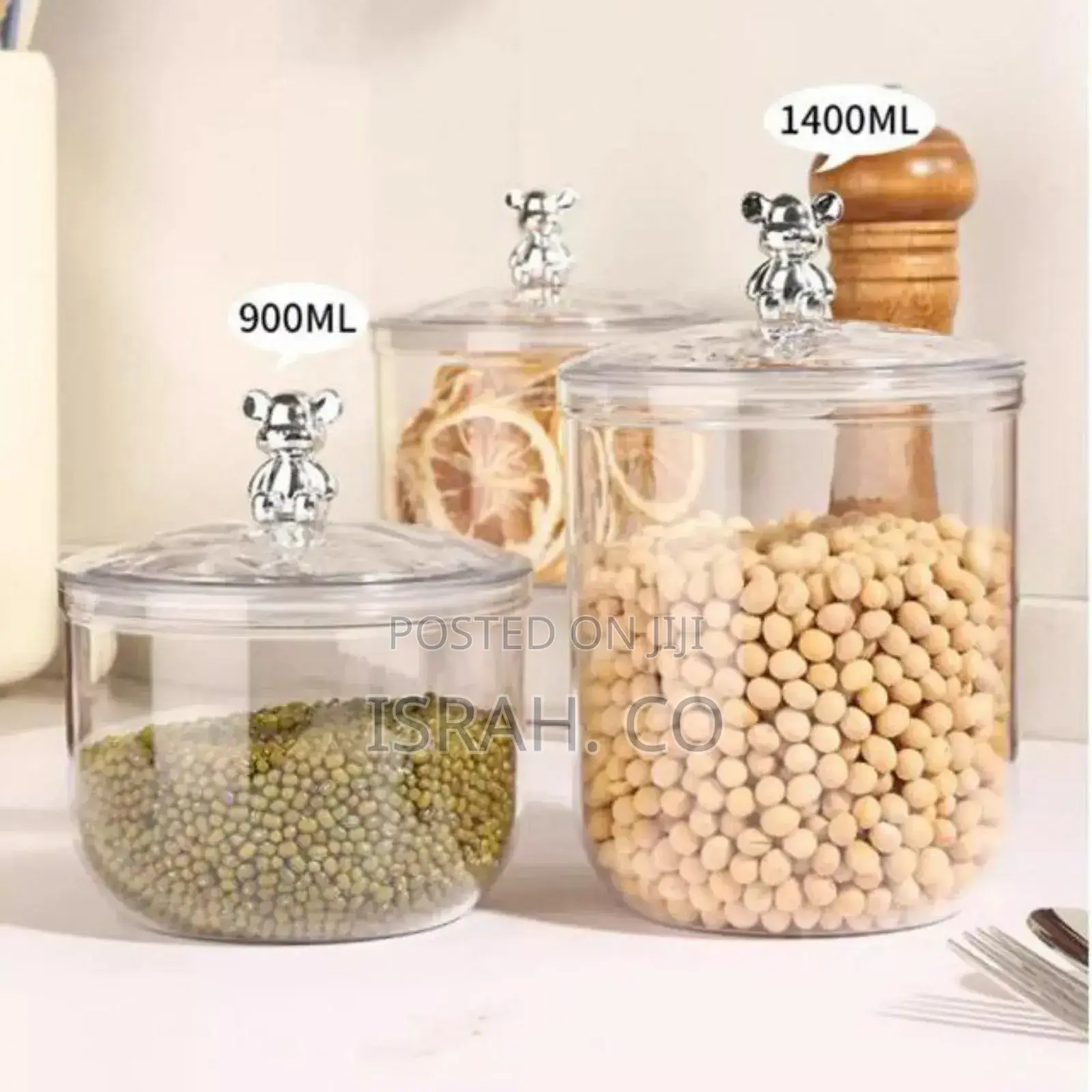 Sealed Jars With Bear-Shaped Handles on Their Airtight Lids