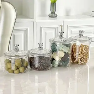 Sealed Jars With Bear-Shaped Handles on Their Airtight Lids