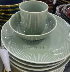 A Set of Noritake Conifere Ash Plates and a Cup.