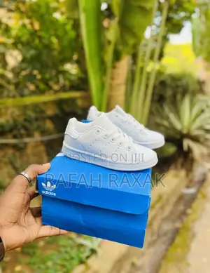 Original Triple White Kid’S Adidas Stan Smith Kid’S Sneakers