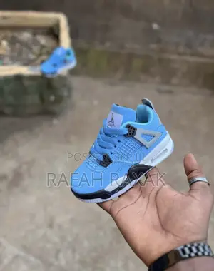 Kid’S Nike Air Jordan 4 Retro University Blue Kid’S Sneakers