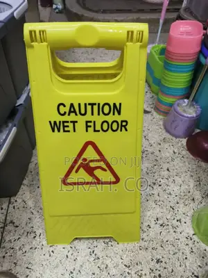 Yellow, Foldable "Caution Wet Floor" Sign.