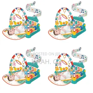 Baby Play Mat With a Piano, Also Referred to as a Baby Gym