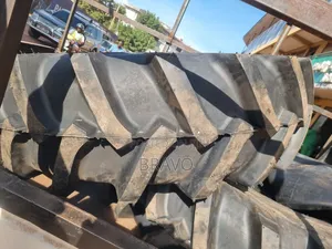 16.9 - 30 Tractor Tyres Behind.