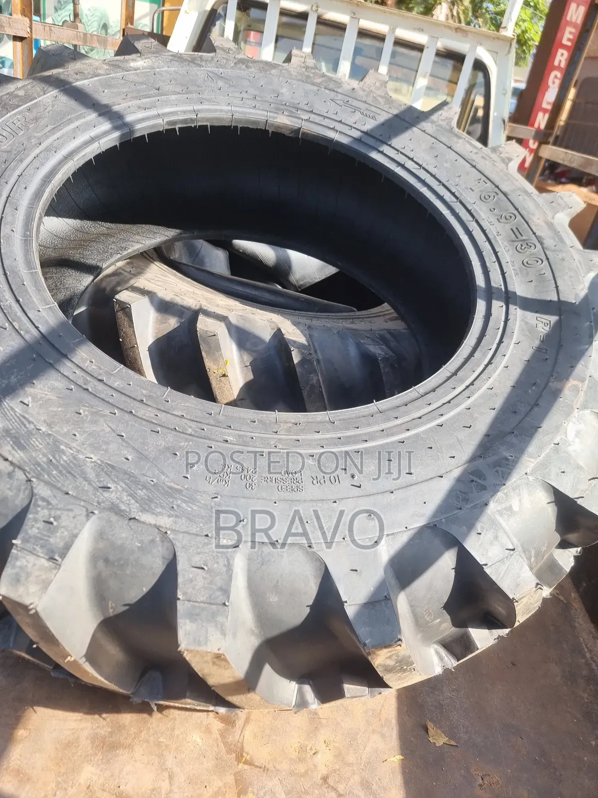 16.9 - 30 Tractor Tyres Behind.