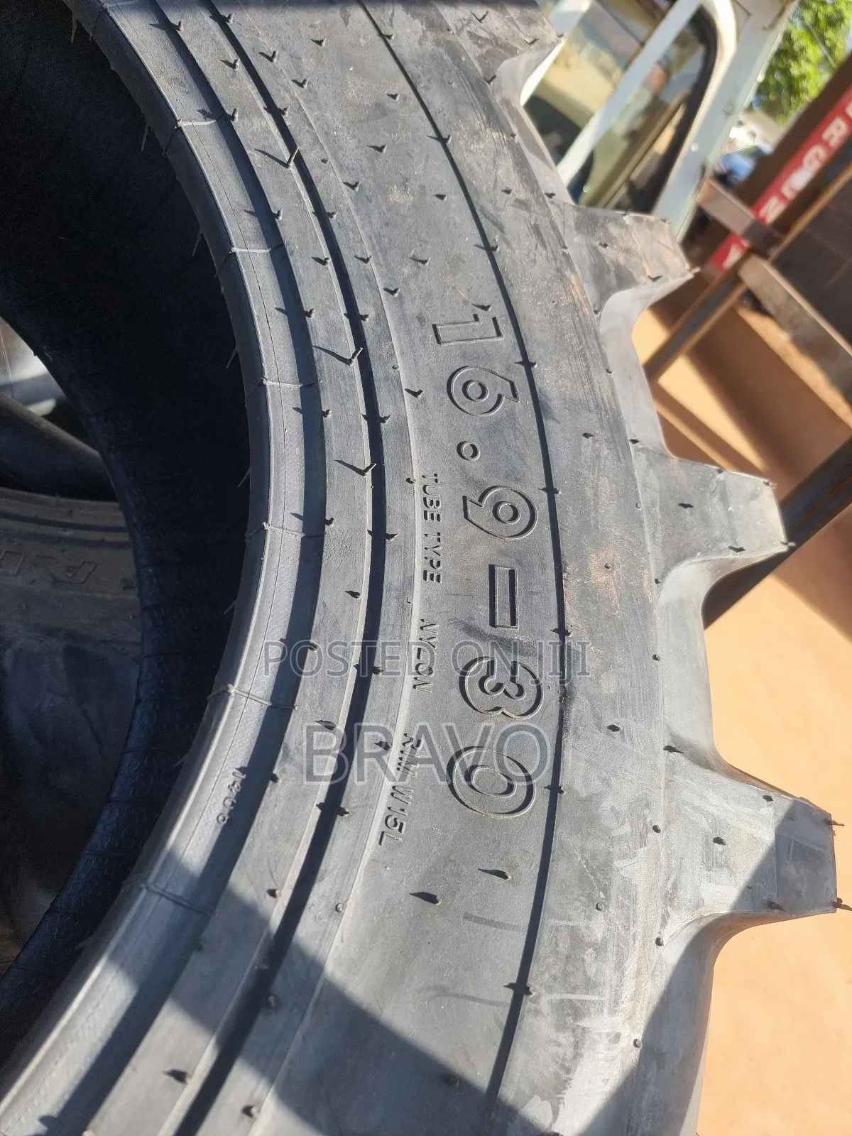 16.9 - 30 Tractor Tyres Behind.