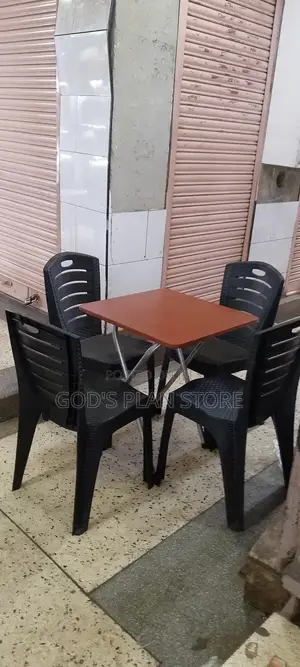 Foldable Table and Black Plastic Chairs Set