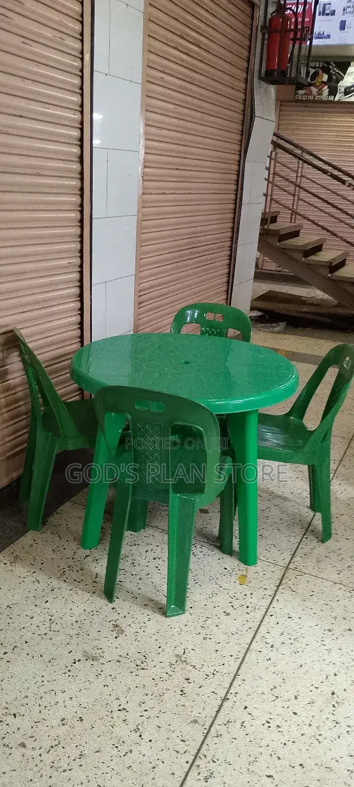 Green Plastic Table and Green Chairs Set