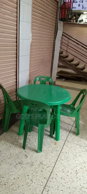 Green Plastic Table and Green Chairs Set