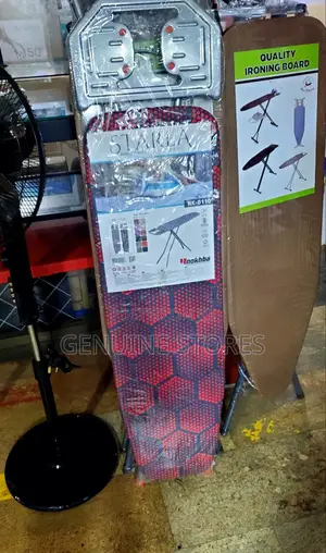 Medium Size Ironing Board With a Flat Iron Stand.