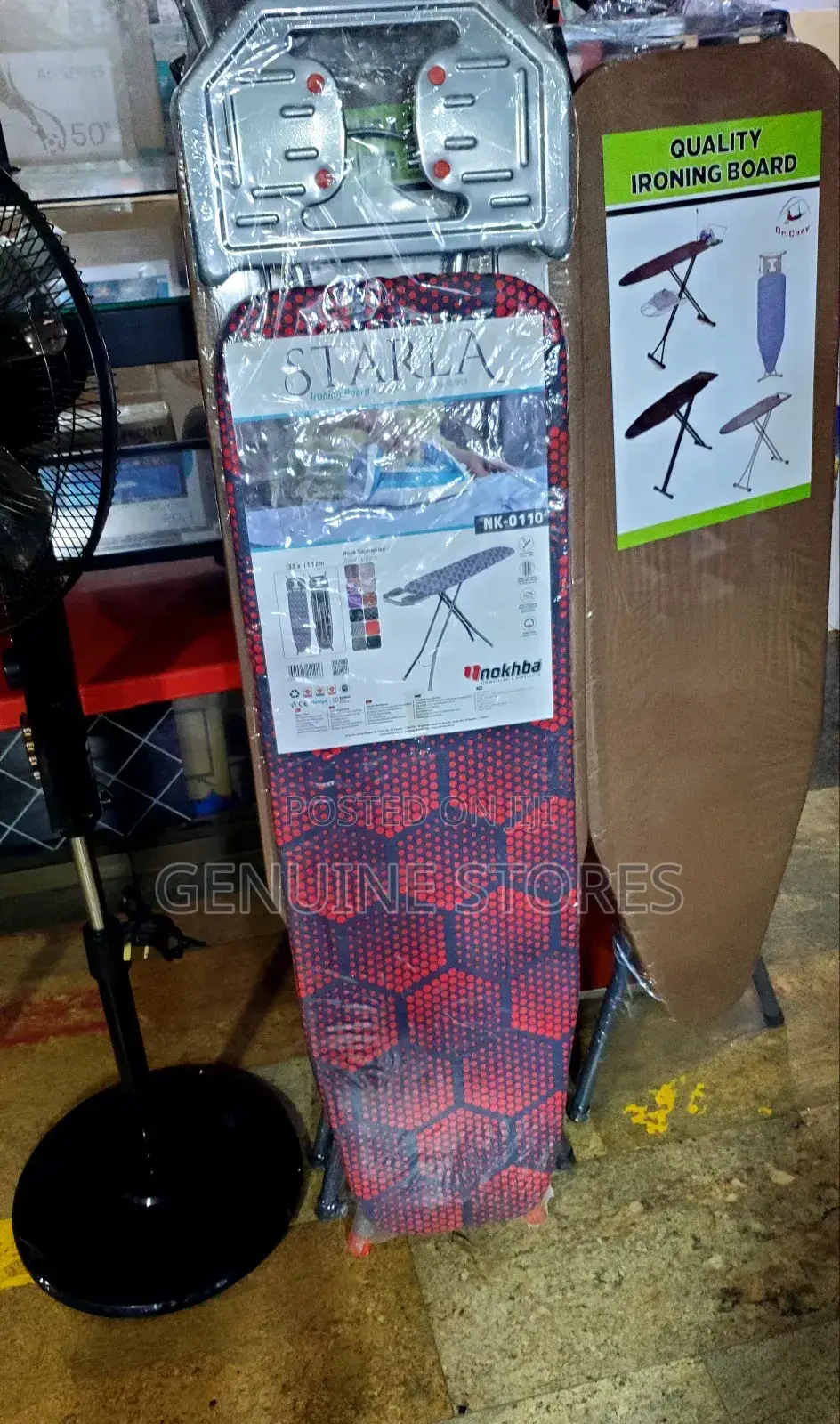 Medium Size Ironing Board With a Flat Iron Stand.